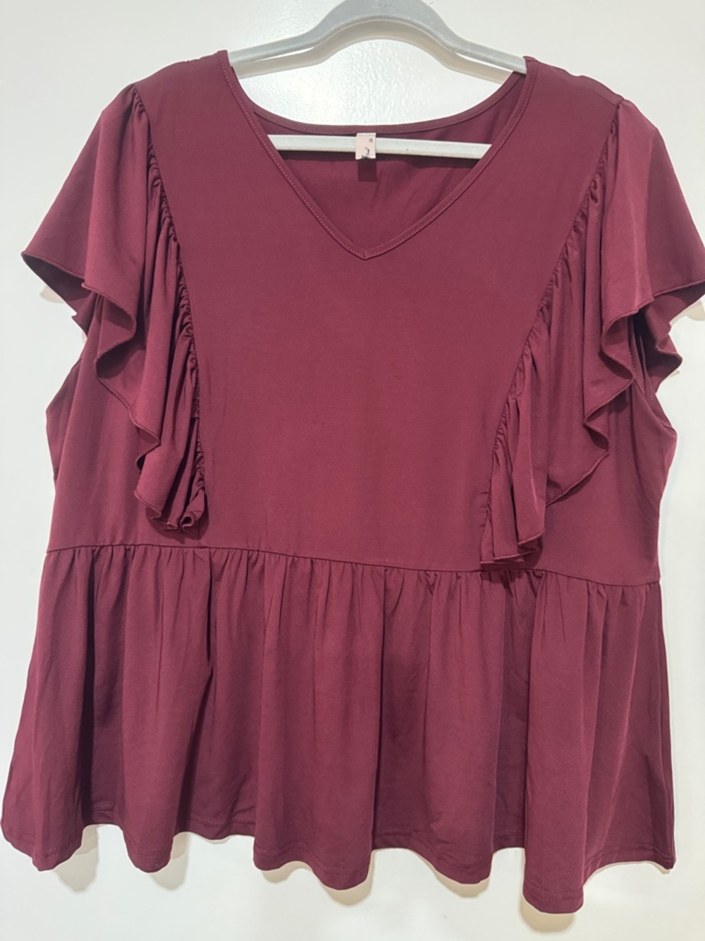 V-Neck Ruffle Sleeve Peplum Tunic in Burgundy
